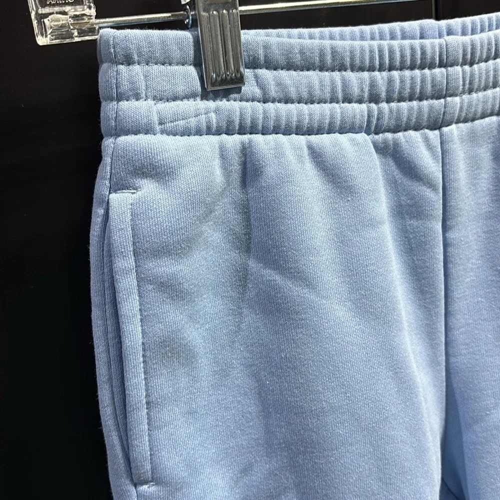 Champion Joggers,elastic waist,hip pockets,rib knit cuff, fleece lined,logo